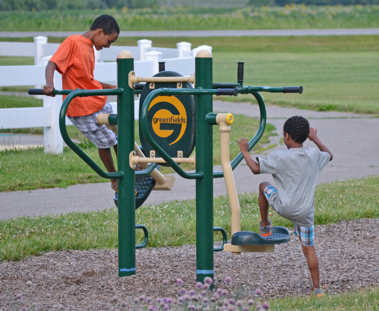 Kids on play equipment at Homestead