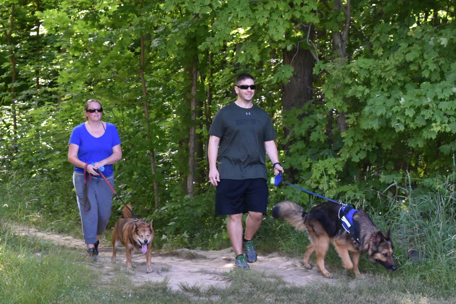  Visitors walk their dogs at Scioto Grove.