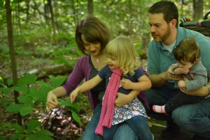 Family and pawpaw leaves by Mike Shiflet