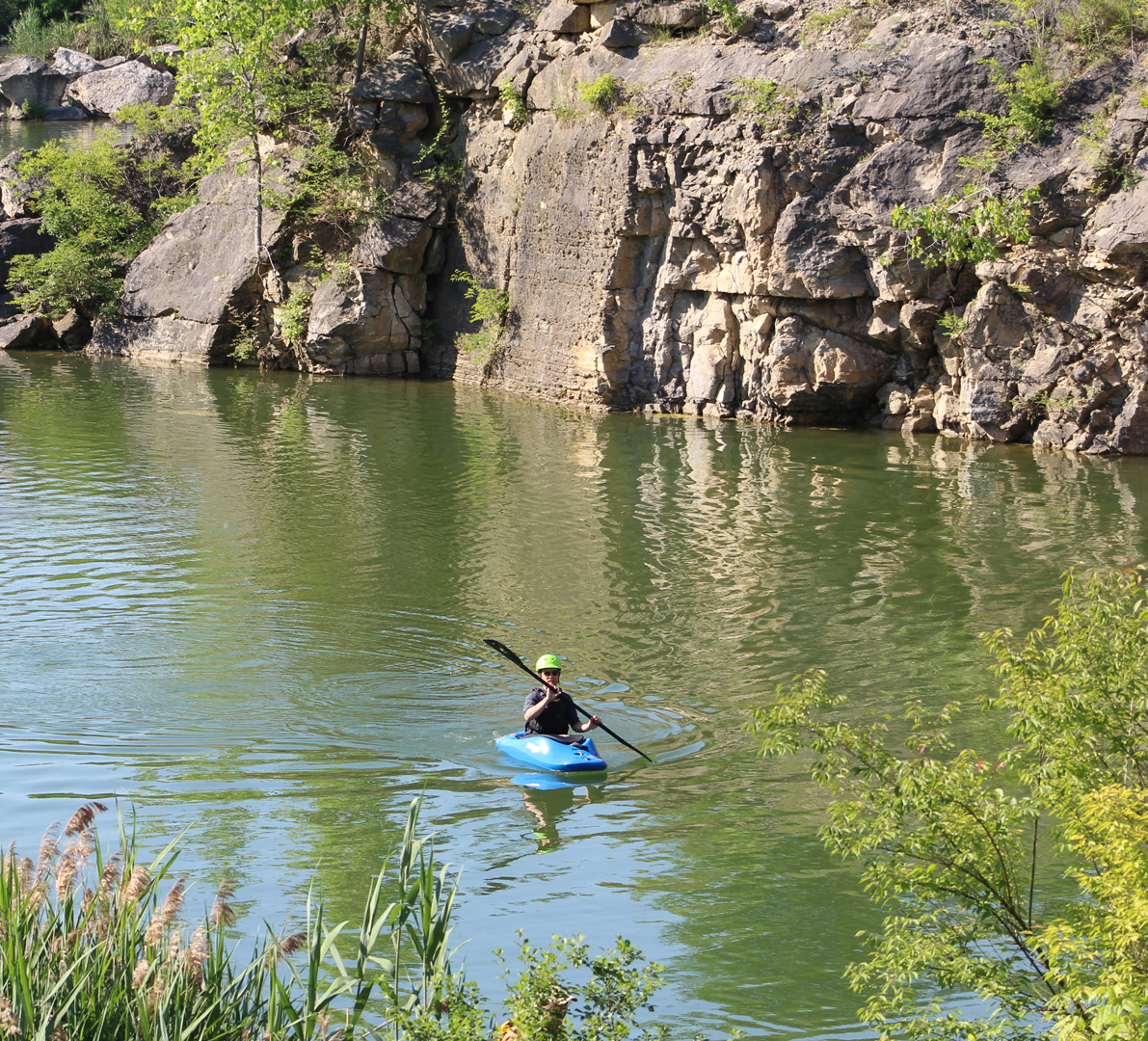 Canoeist on the quarry lake at Quarry Trails Metro Park