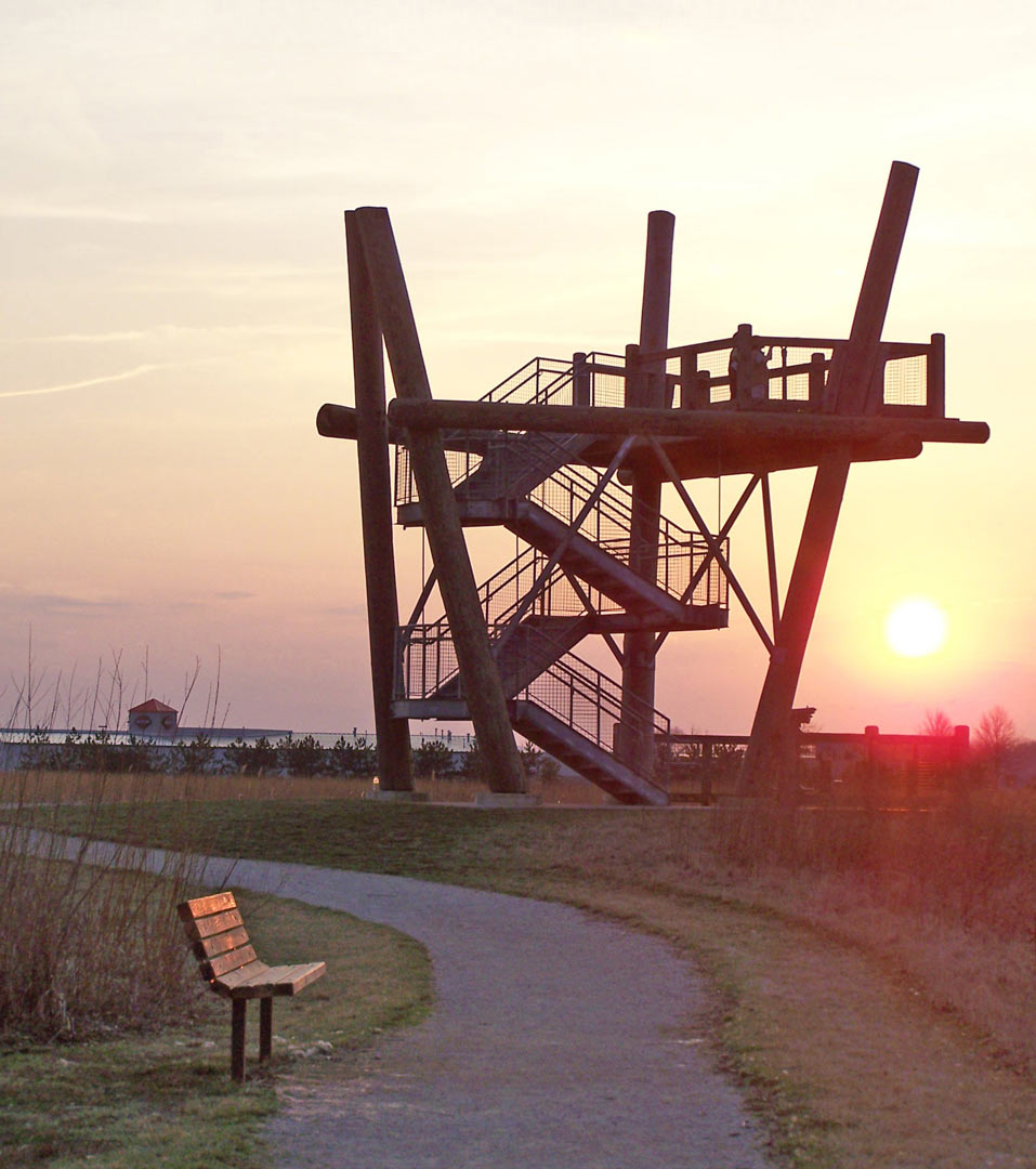 Sun sets behind the observation tower at Glacier Ridge wetlands