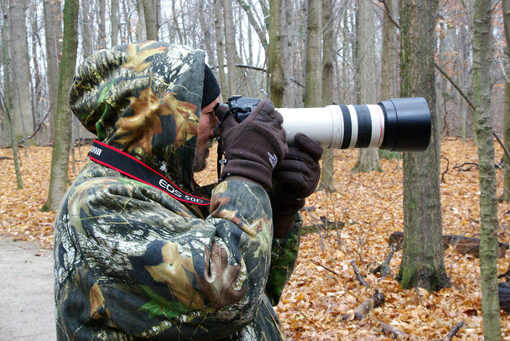 Photographer with long lens at Blacklick Woods Metro Park.
