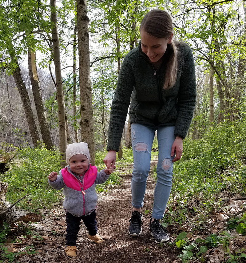 Woman and child walk on the Sycamore Trail at the River Bluff area at Highbanks Metro Park